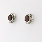 Side View Silver Garnet 5x7mm Oval Post Earrings