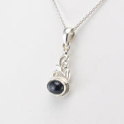 Silver Black Star Diopside Oval Scroll Pendant