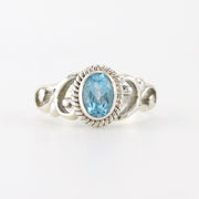 Silver Blue Topaz 5x7mm Oval Scroll Ring