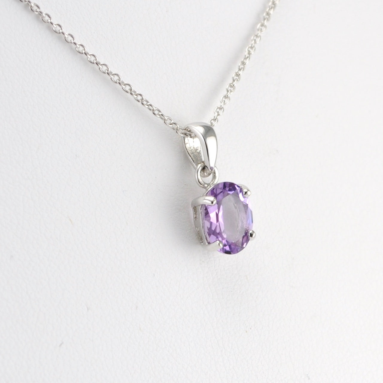 Side View Silver Amethyst Oval Drop Necklace