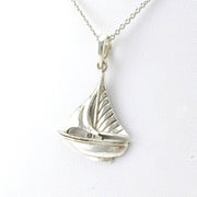Side View Sterling Silver Sailboat Necklace
