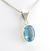 Side View Sterling Silver Blue Topaz Oval Pendant