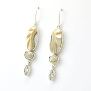 Side View Sterling Silver Nautilus Shell White Topaz Earrings