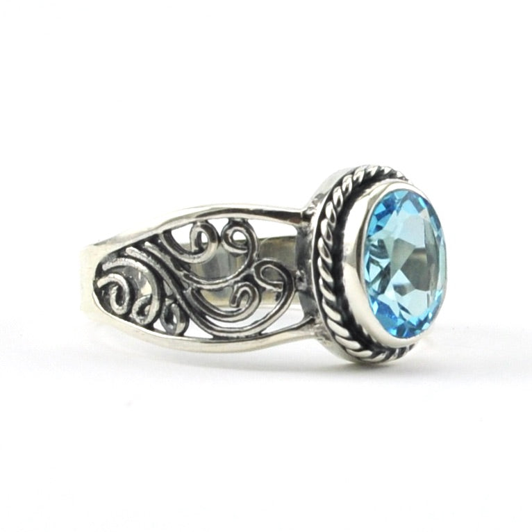 Side View Sterling Silver Blue Topaz 6x8mm Scroll Bali Ring