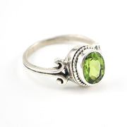 Alternate View Silver Peridot 7x9mm Oval Scroll Ring