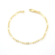 Gold chain bracelet on a white background