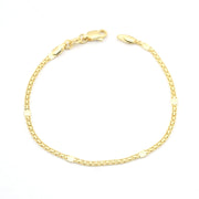 Gold bracelet on a white background