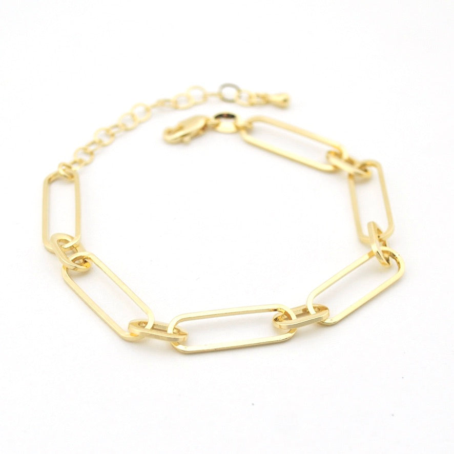 Gold chain bracelet on a white background