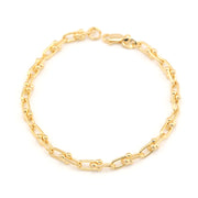 Gold chain bracelet on a white background