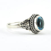 Side View Sterling Silver Blue Topaz 6x8mm Oval Bali Ring