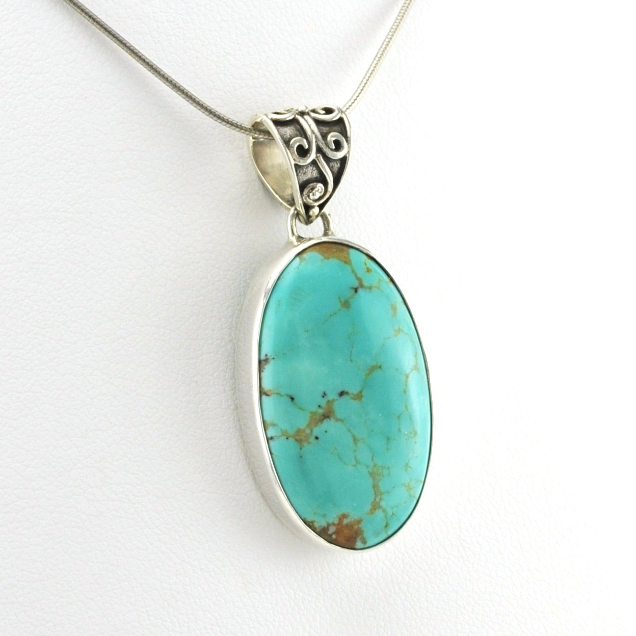 Side View Sterling Silver Arizona Turquoise 16x26mm Oval Bali Bail Pendant