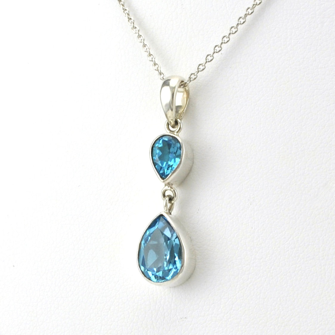 Side View Sterling Silver Blue Topaz Pear Tear Necklace