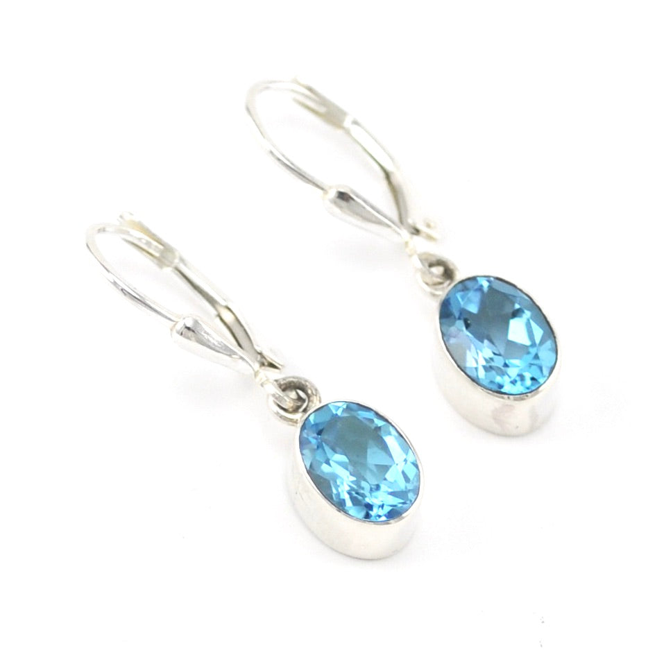 Silver Blue Topaz 6x8mm Oval Dangle Earrings