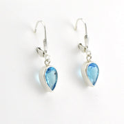 Side View Sterling Silver Blue Topaz 6x9mm Pear Dangle Earrings