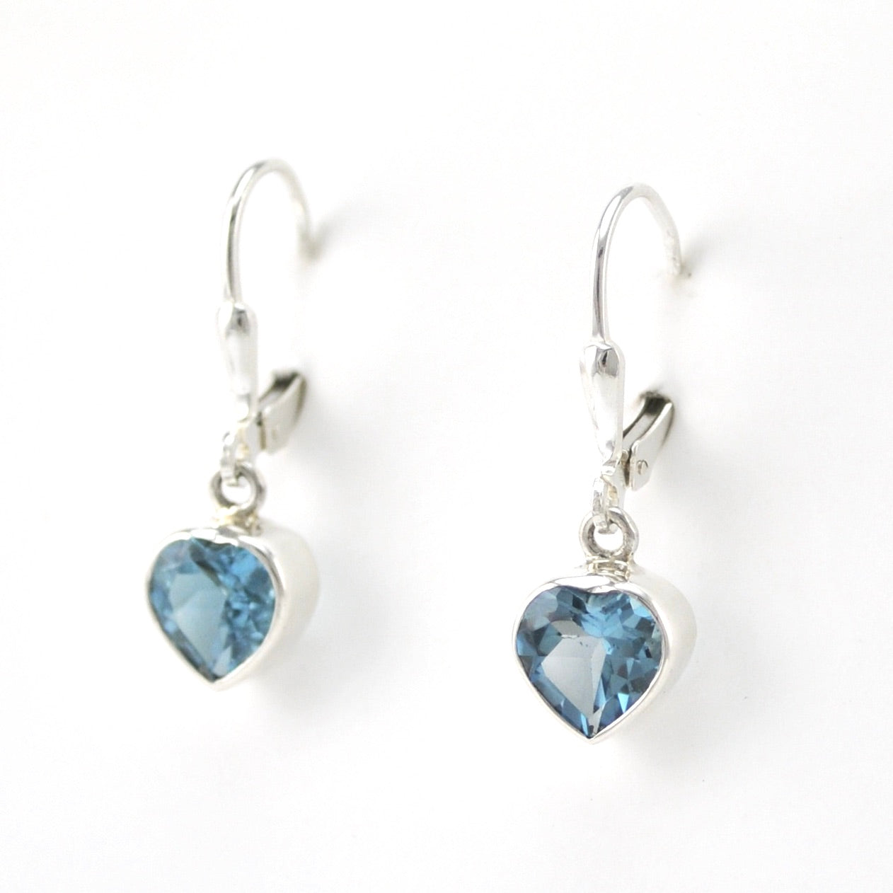 Side View Silver Blue Topaz 7mm Heart Dangle Earrings