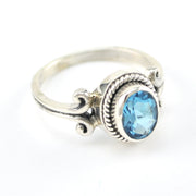 Alternate View Silver Blue Topaz 6x8mm Oval Scroll Ring