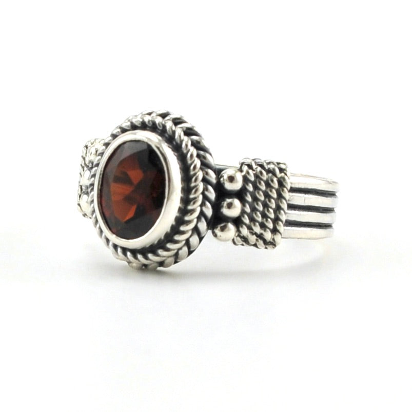 Sterling Silver Garnet 6x8mm Oval Bali Ring