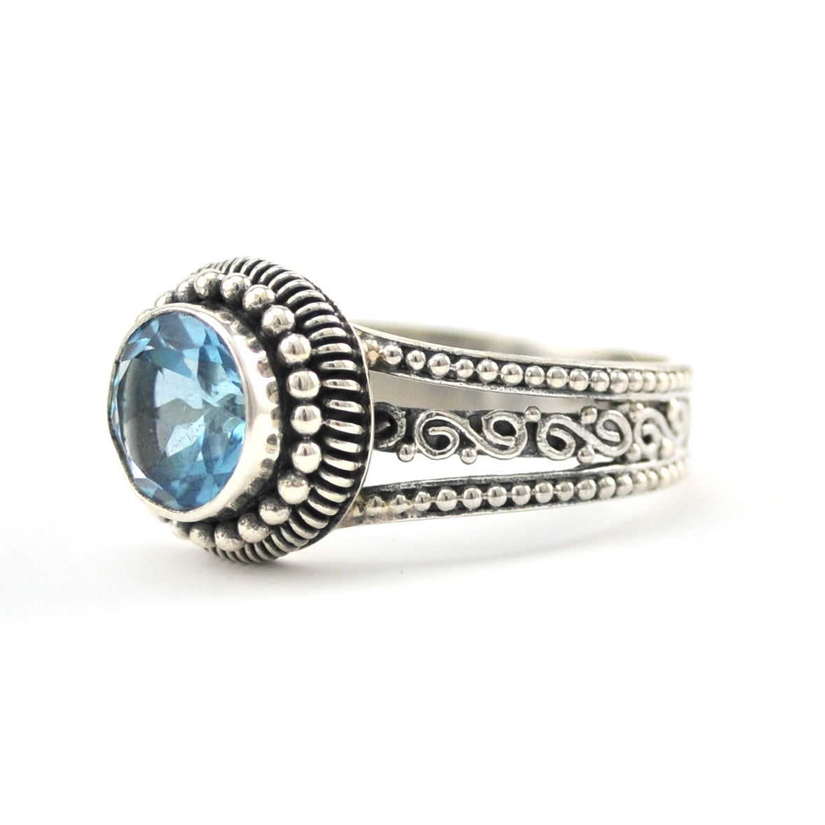 Side View Silver Blue Topaz 8mm Round 3 Band Scroll Ring