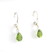 Side View Silver Peridot 6x8mm Tear Dangle Earrings