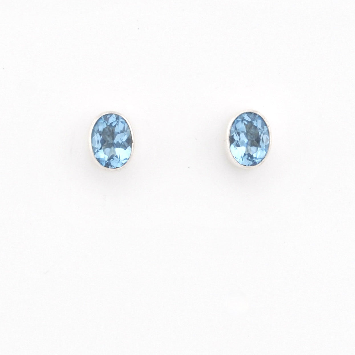 Sterling Silver Blue Topaz Oval Post Earrings