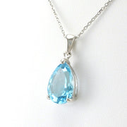 Side View Sterling Silver Blue Topaz 10x16mm Tear Necklace