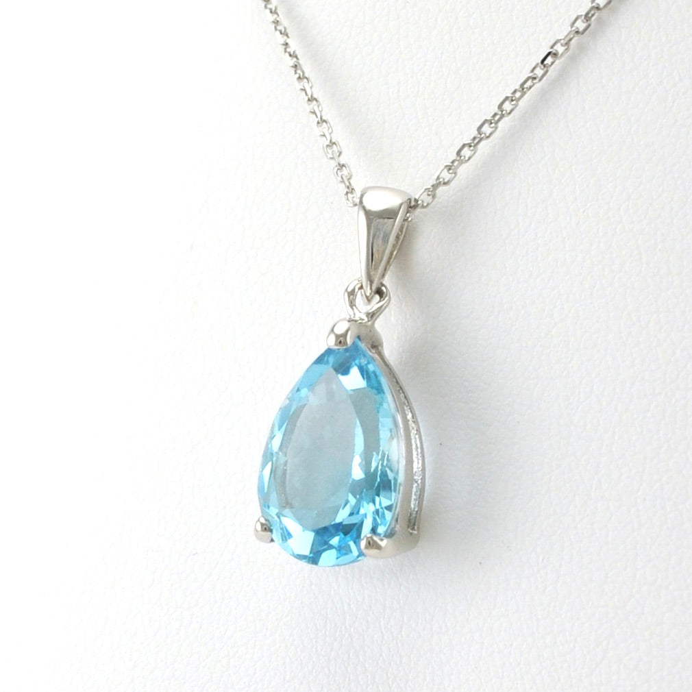 Side View Sterling Silver Blue Topaz 10x16mm Tear Necklace