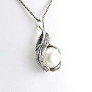 Side View Sterling Silver White Pearl in Wrapped Feather Setting Necklace