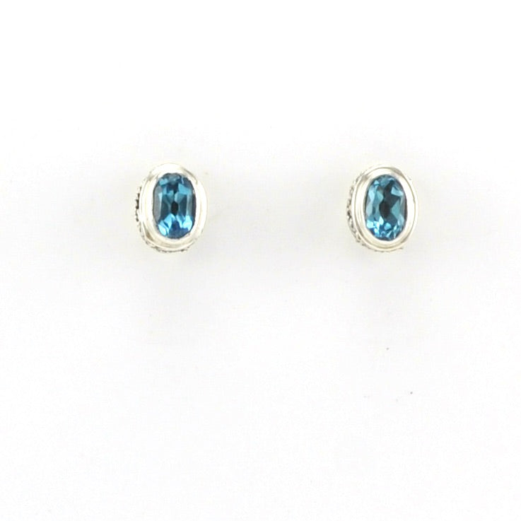 Alt View Sterling Silver Blue Topaz 4x6mm Oval Bali Post Earrings
