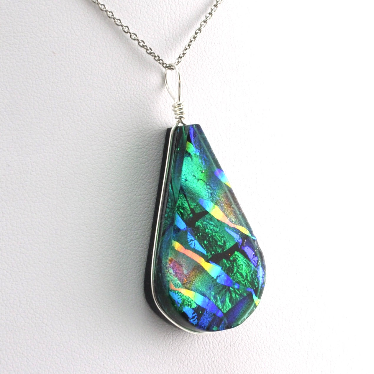 Side View Dichroic Glass Rainbow Green Teardrop Pendant