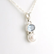 Side View Sterling Silver Blue Topaz Pearl Necklace