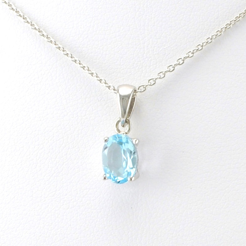 Side View Sterling Silver Blue Topaz 6x8mm Oval Drop Necklace