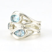 Side View Sterling Silver Blue Topaz 3 Stone Ring