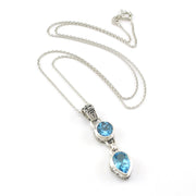 Sterling Silver Blue Topaz Round Pear Bali Necklace