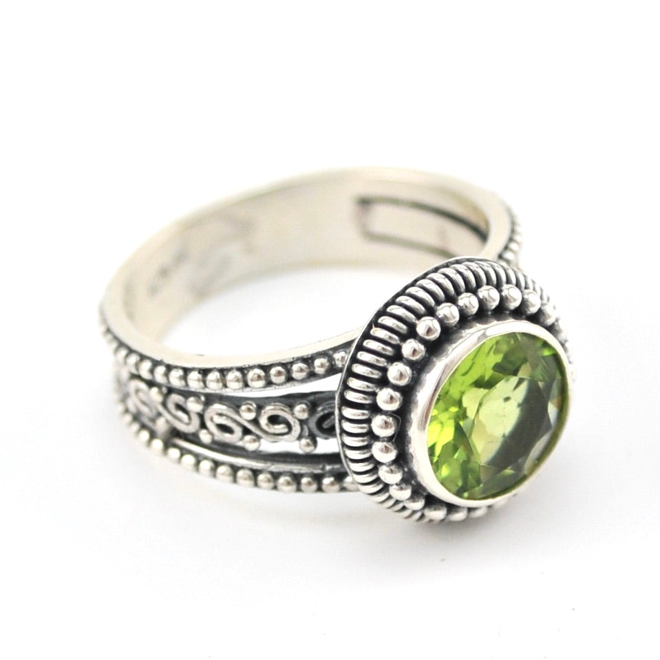 Side View Silver Peridot 8mm Round 3 Band Scroll Ring