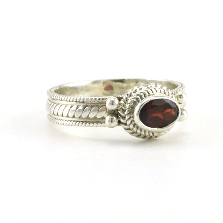 Alt View Sterling Silver Garnet 4x6mm Oval Rope Band