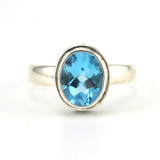 Alt View Sterling Silver Blue Topaz 7x9mm Oval Bali Ring