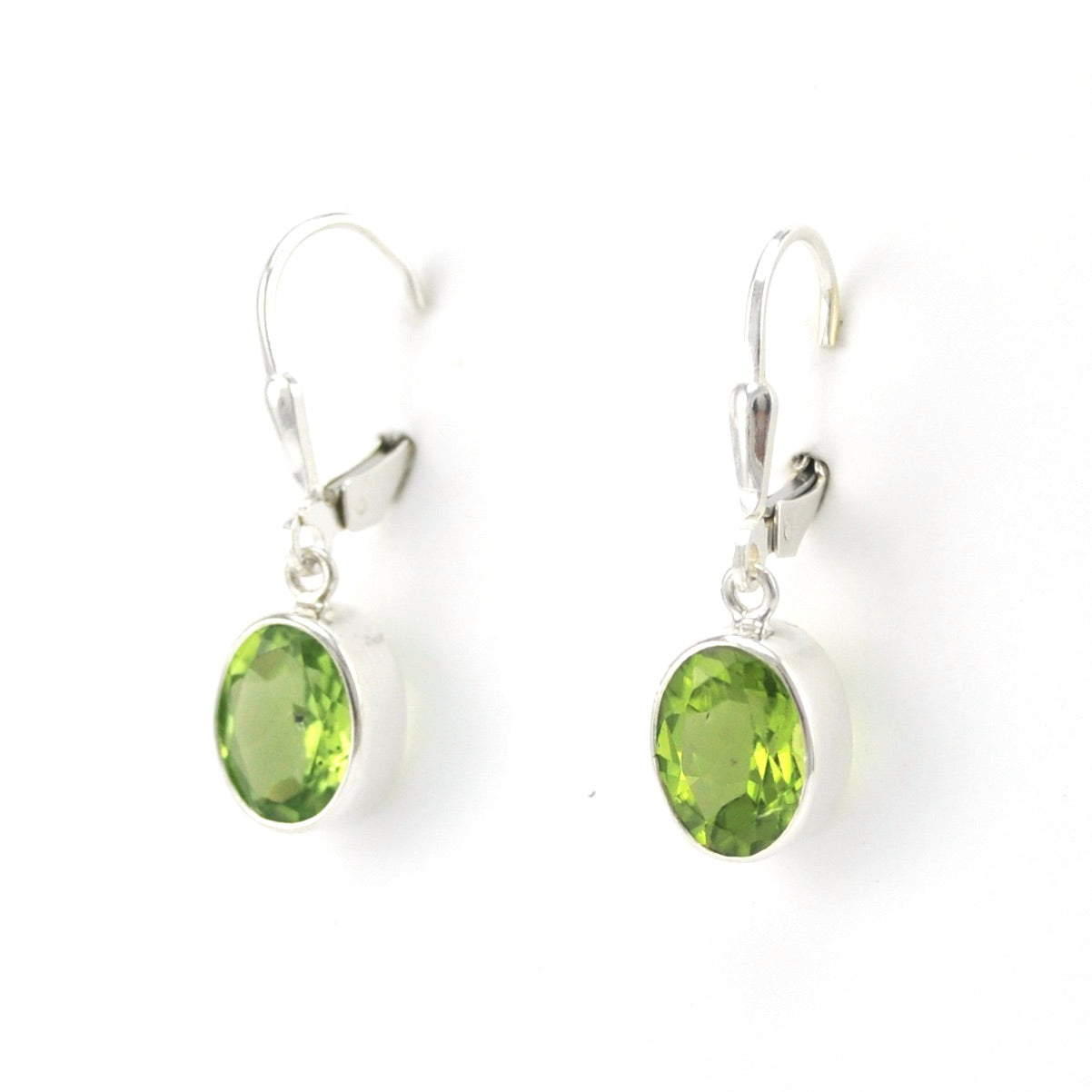 Side View Silver Peridot 7x9mm Oval Dangle Earrings