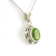 Side View Sterling Silver Peridot 7x9mm Oval Pendant
