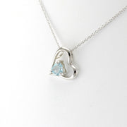 Side View Sterling Silver Blue Topaz Heart within Heart Necklace