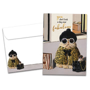 Greeting card with a stylish cat in a leopard print coat and sunglasses, accompanied by an envelope.