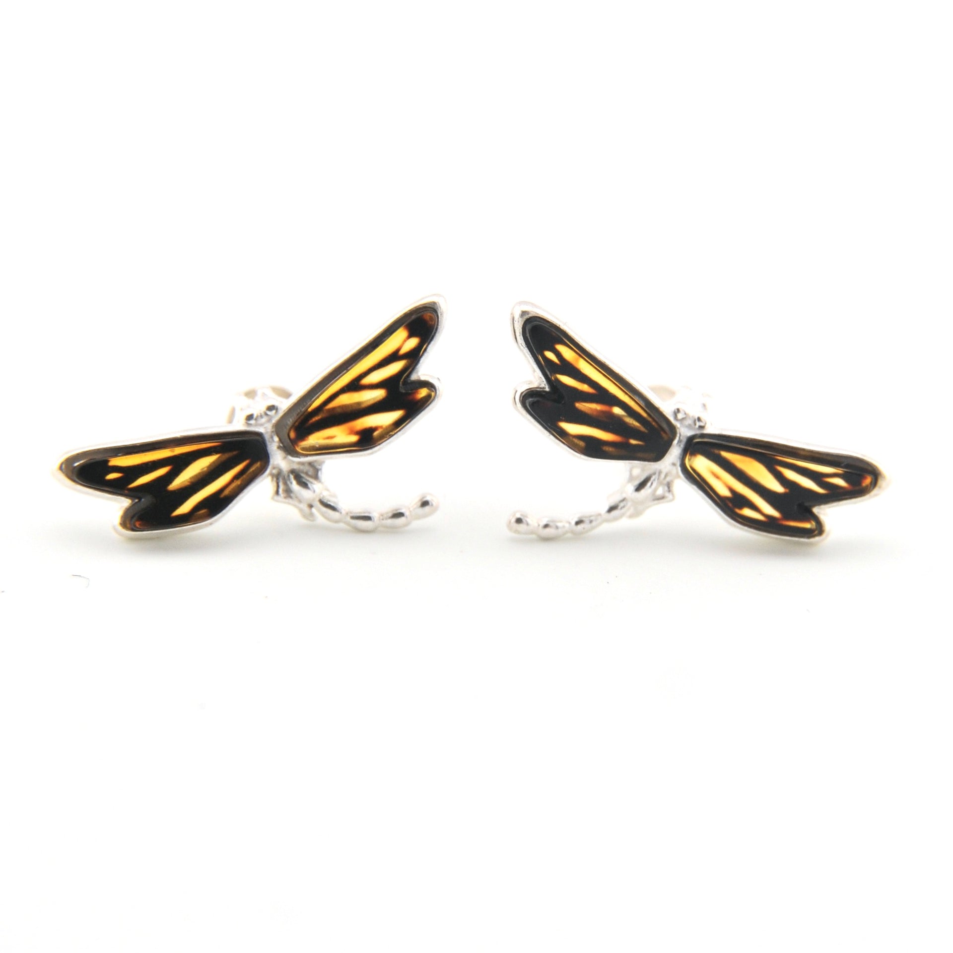 Dragonfly earrings on a white background