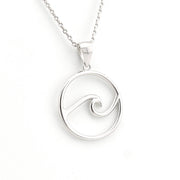 Silver wave pendant necklace on a white background
