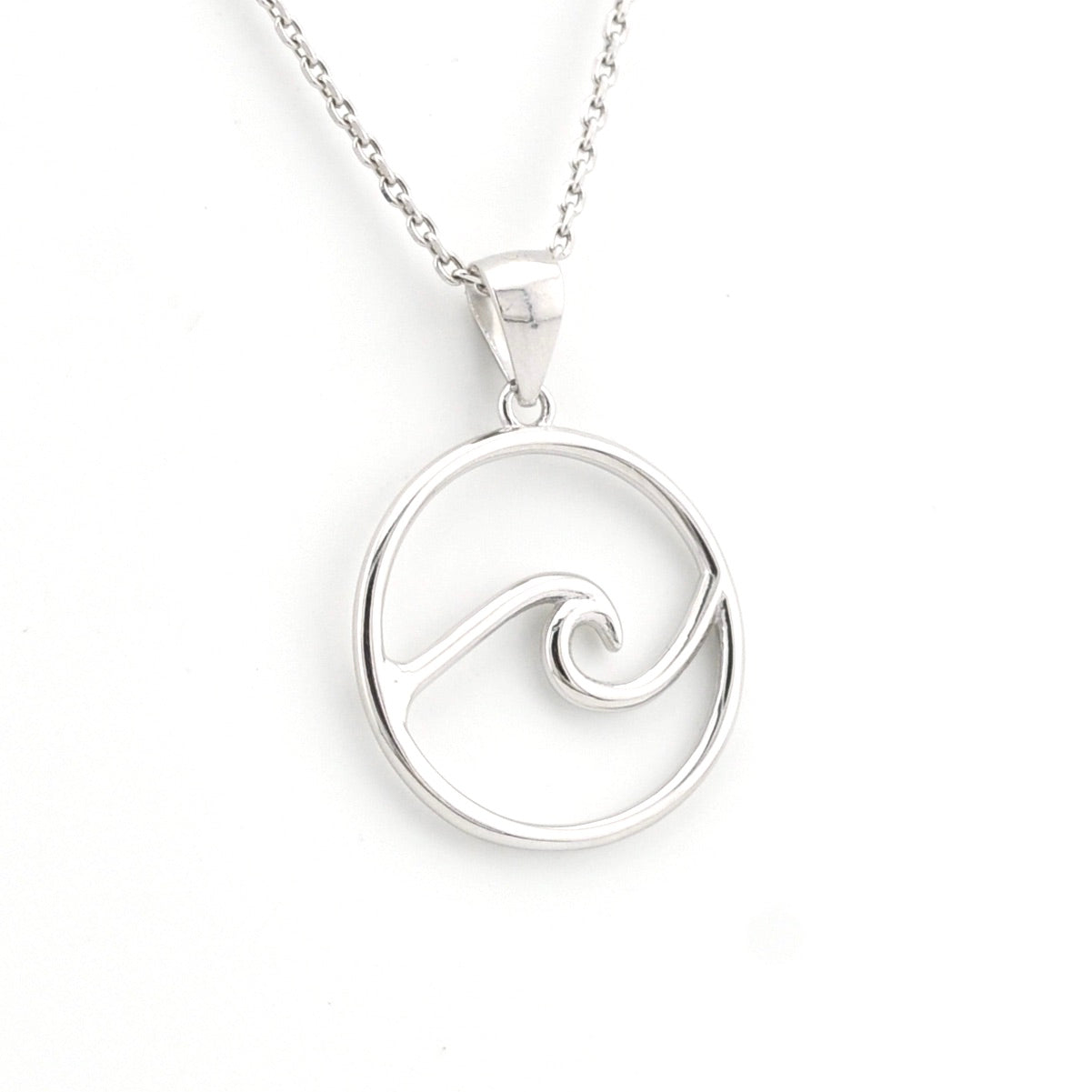 Silver wave pendant necklace on a white background