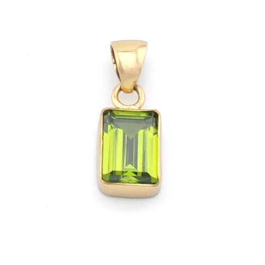 A yellow gold pendant featuring a rectangular emerald-cut green gemstone, set against a plain white background.
