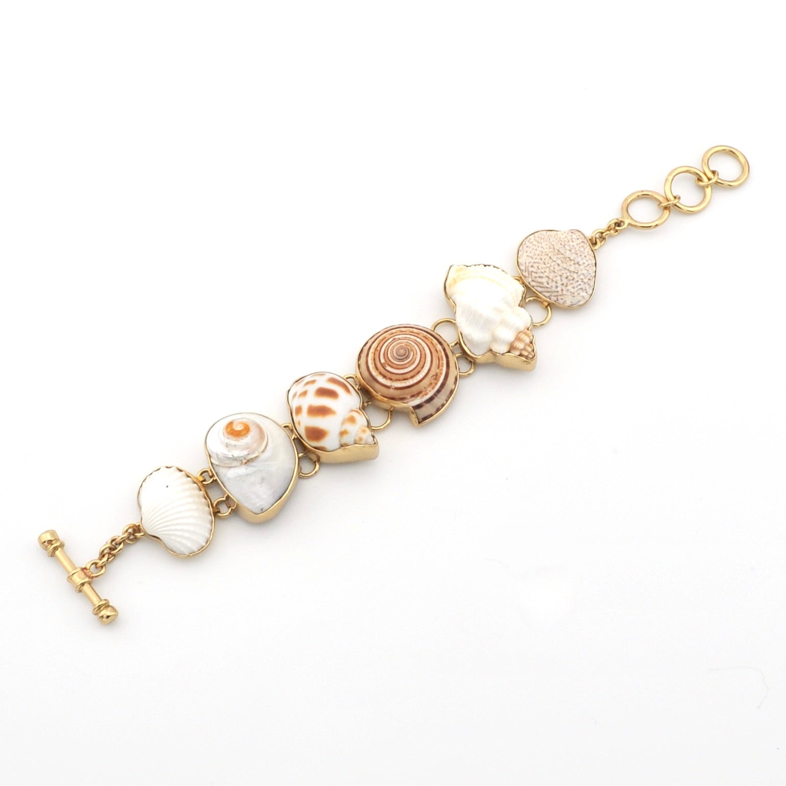 Bracelet with shell-shaped beads on a white background