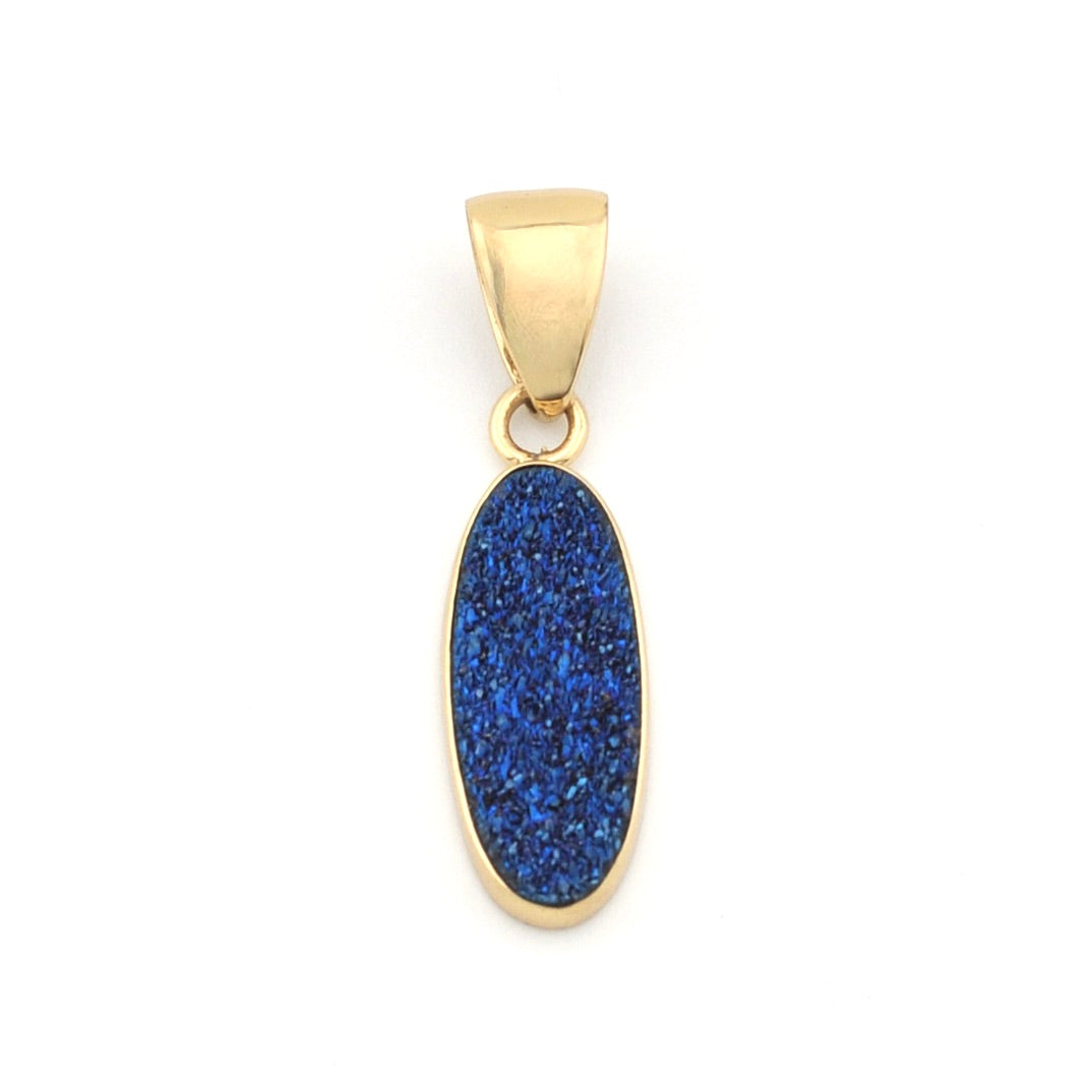 Gold pendant with a blue druzy stone on a white background
