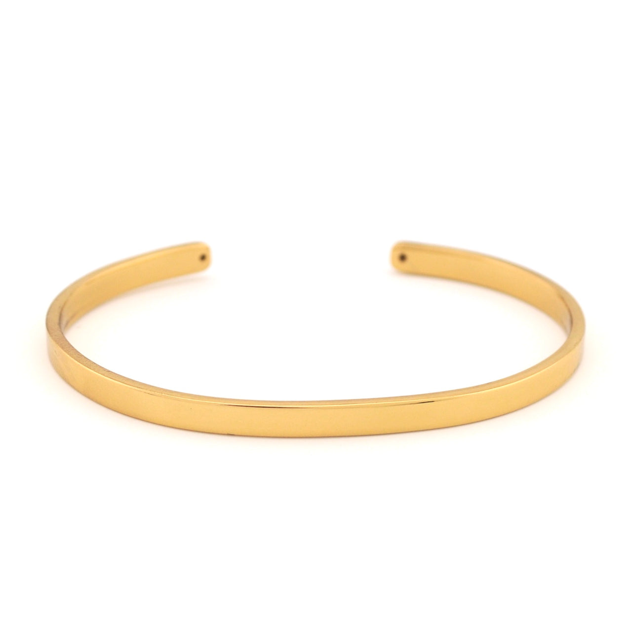 Gold bangle on a white background