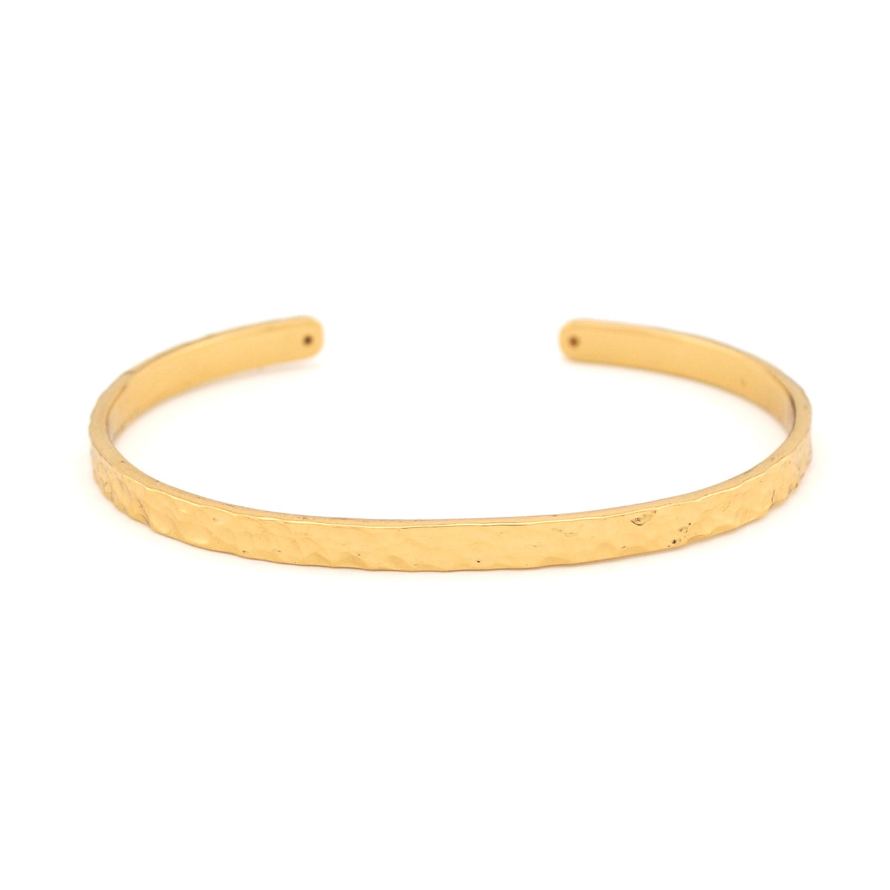 Gold bangle on a white background