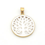 Gold pendant with a white circular design on a white background