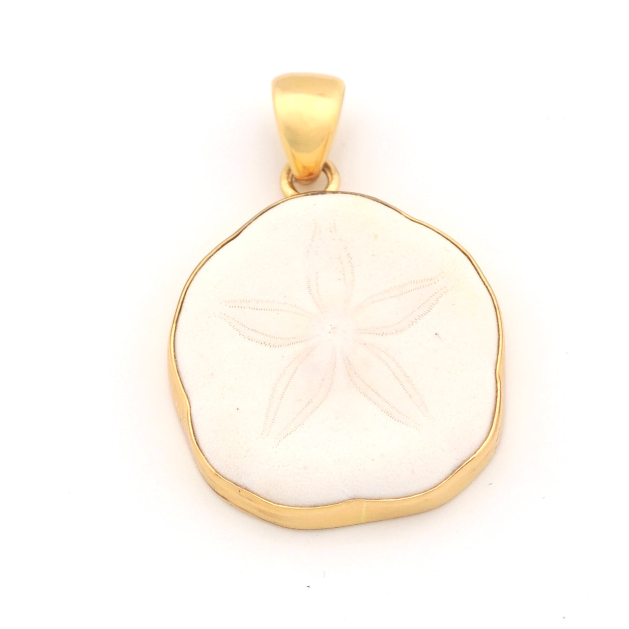 Gold pendant with a white stone on a white background